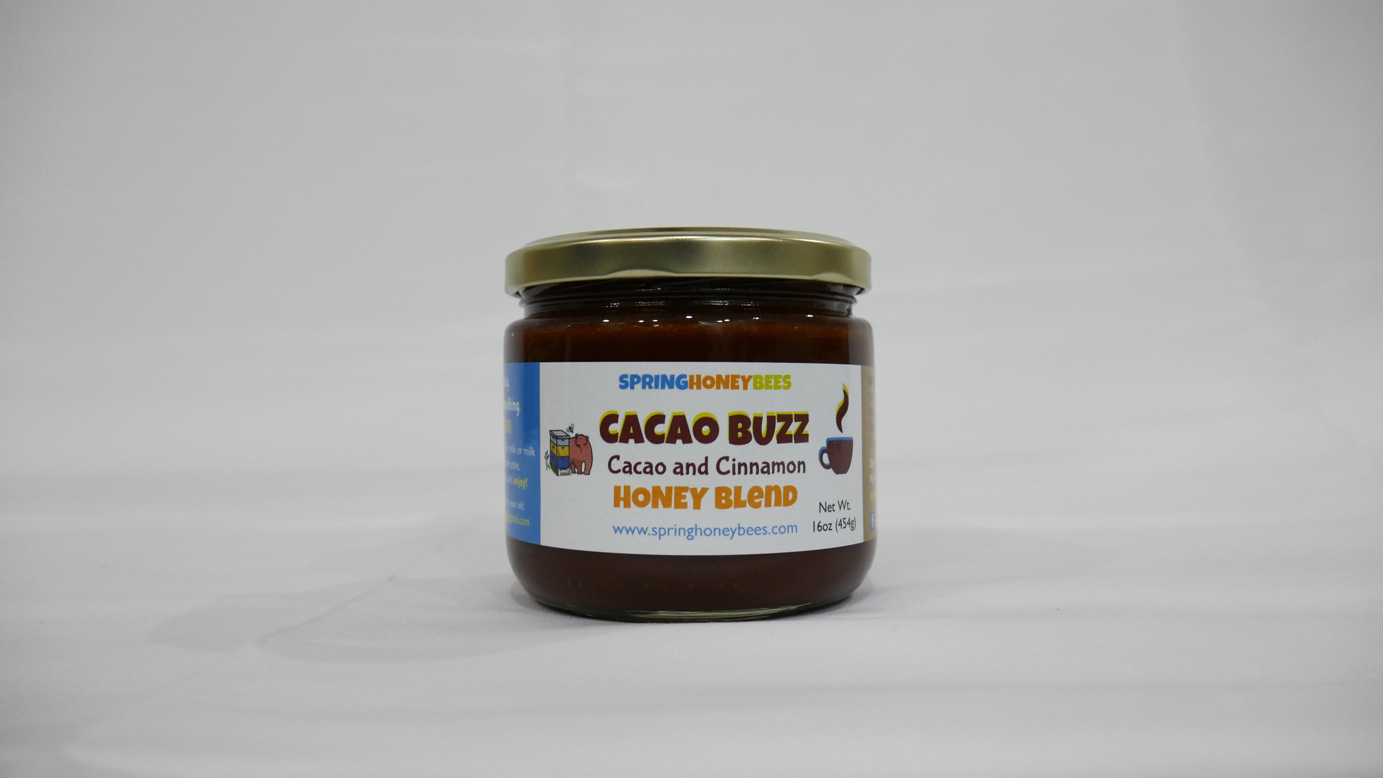 CACAO BUZZ raw honey blended with cacao, cinnamon and cayenne